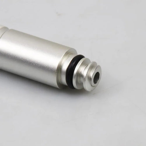 Silver metal transmission refuelling joint tool for VAS6262-9 on a workshop bench.