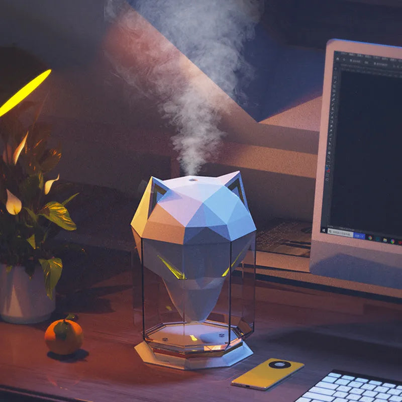 War Wolf black and white ultrasonic desktop humidifier with colourful LED lights on, showing mist outlet.