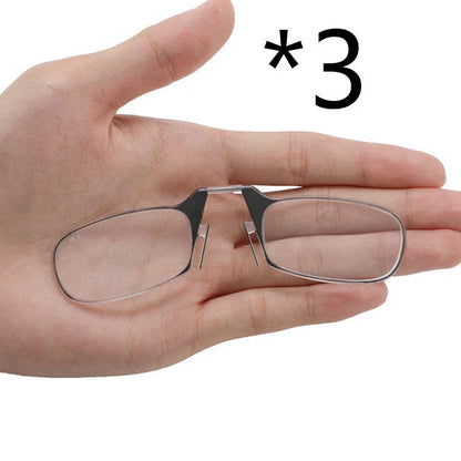 Compact magnetic reading glasses with rimless frames and adjustable nose clip