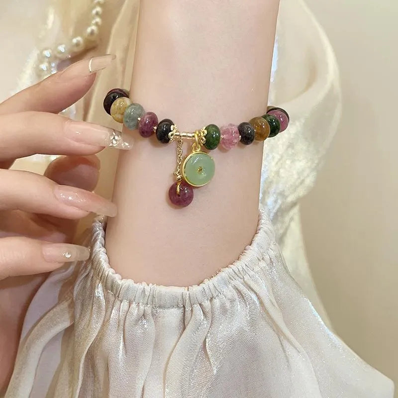 Handmade natural stone bracelet with colourful tourmaline rabbit pendant and geometric round beads