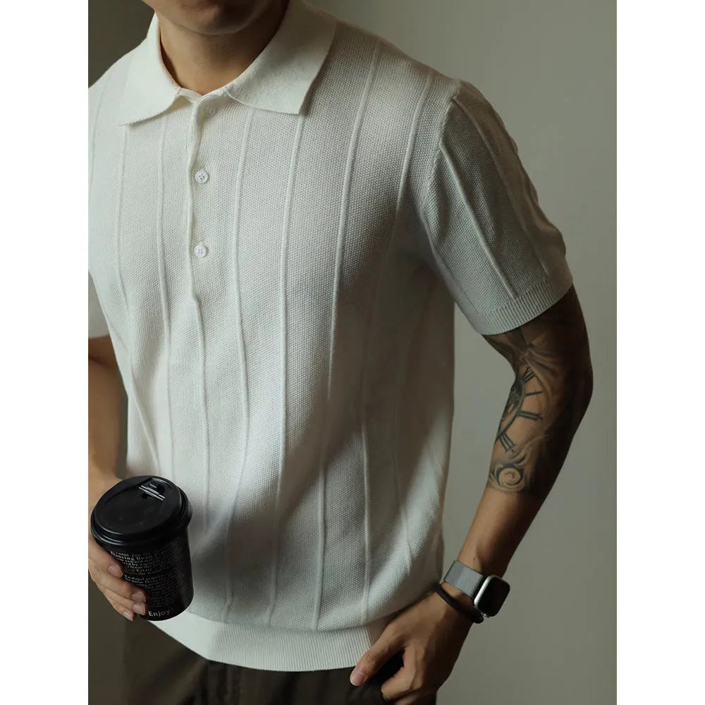 Man wearing a solid black loose fit basic polyester T-shirt for casual wear.