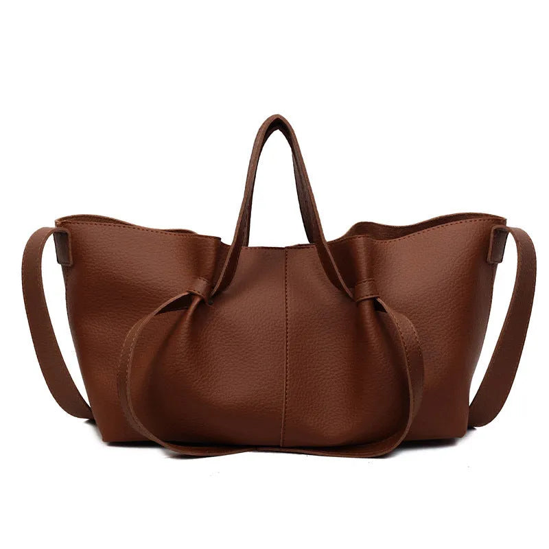 Large capacity one-shoulder crossbody bag in soft PU with sewing line detail, horizontal square shape, available in black, brown, coffee, gray
