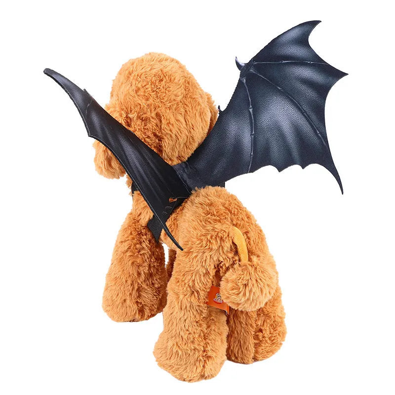 Black cloth bat wing costume for pets on a dog, showing three size options for Halloween.