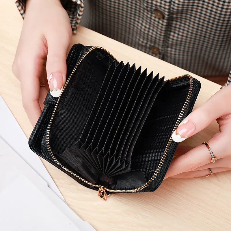 Ladies' short beige wallet with a lychee fruit pattern, shown folded.
