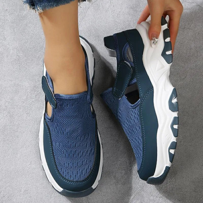 Women's mesh sport shoes with round toe, low heel, and Velcro fastening in a solid colour