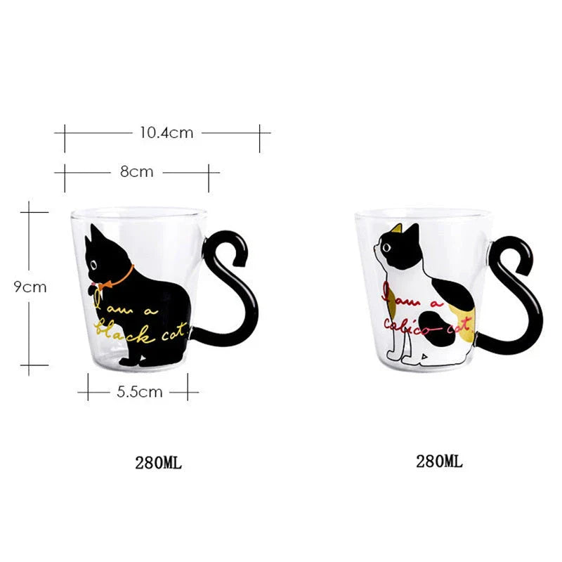 Adorable cat-shaped glass mug with a playful cat tail handle, perfect for coffee, tea, and juice lovers