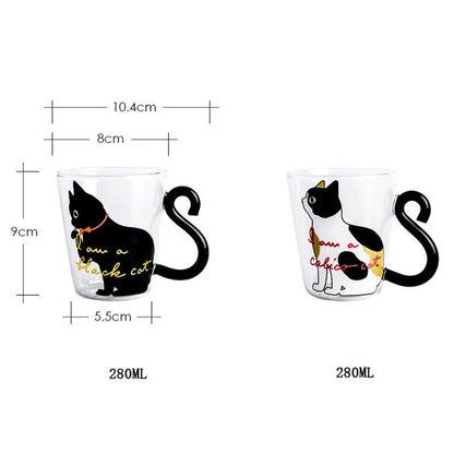 Adorable cat-shaped glass mug with a playful cat tail handle, perfect for coffee, tea, and juice lovers