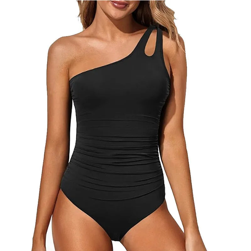 Adult women's solid colour monokini swimsuit with shoulder straps on a mannequin.