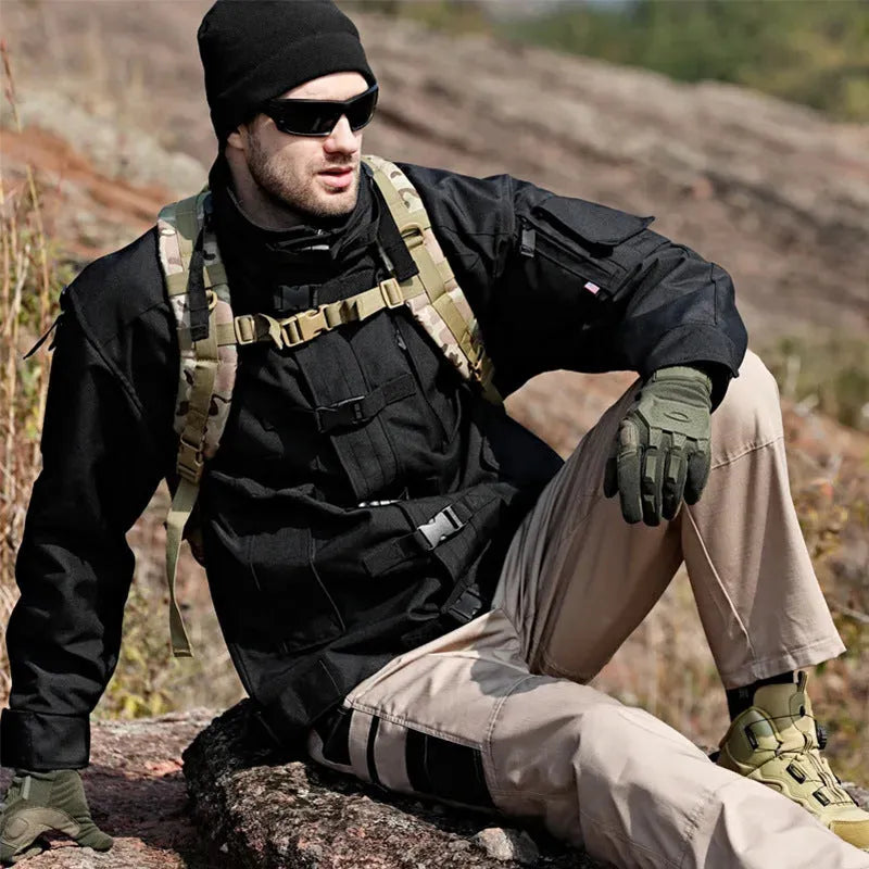 Multi-pocket water repellent outdoor pants in polyester cotton blend, available in five colours, sizes S to XXXL