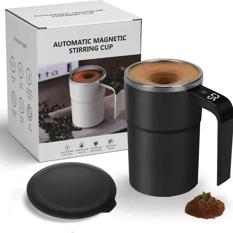 Black and white USB rechargeable electric stirring mug with LCD screen showing temperature, next to its magnetic stirrer.