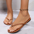 Woven design flip flops for women with plastic upper, rubber sole, in black colour, summer beach sandals