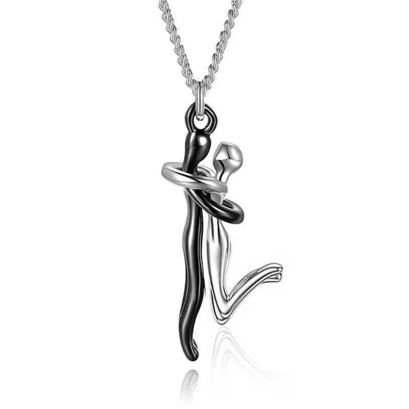 Copper couple's humanoid hug pendant necklace in electroplated gold with curbs chain