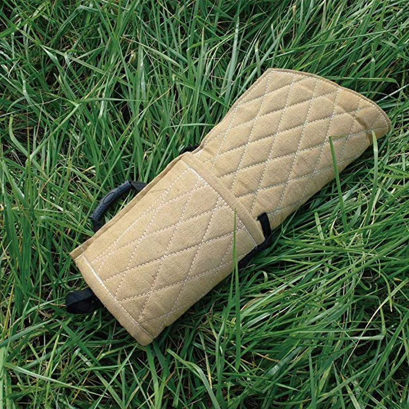 Jute dog bite training sleeve 65 x 28 cm with internal plastic handle, external foam handle, and black side hanging handle.