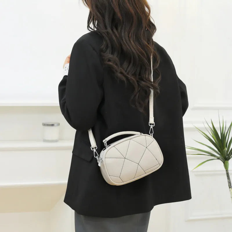 Round grey PU leather patchwork small bag with decorative stitching, shown next to a tape measure indicating 20x15 cm size.