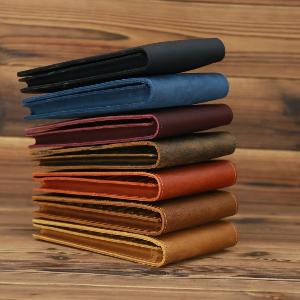 Men's black cowhide leather card holder wallet open to show 18 card slots, money pocket, and phone pocket.