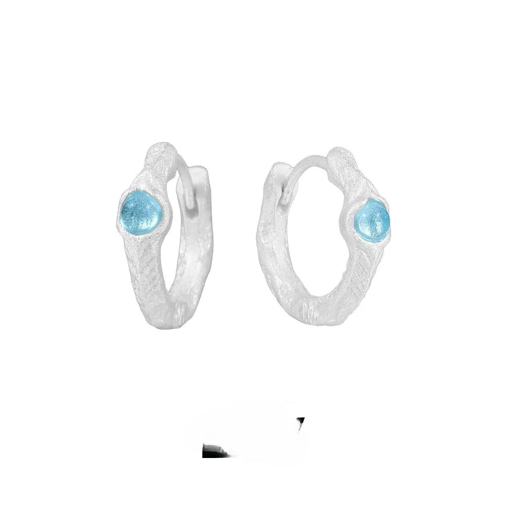Geometric round ear clip in burnt silver electroplated finish made from 925 sterling silver