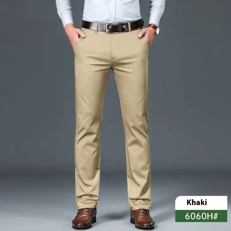 Men's straight leg trousers in black, shown on a hanger, featuring a non-iron stretch fabric blend.