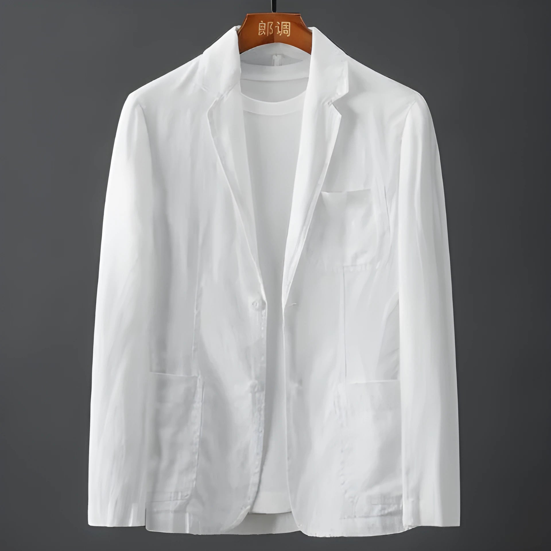 Men's slim fit linen suit jacket in blue with nine-point sleeves on a hanger.