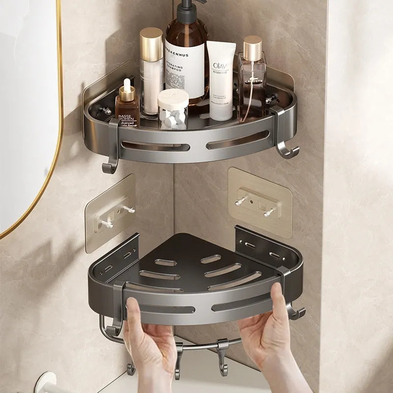 Gun grey wall-mounted corner bathroom storage rack with a single shelf, shown in a shower.