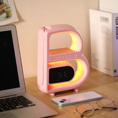 B-shaped Bluetooth desk lamp with wireless charging, adjustable lighting, and alarm clock features