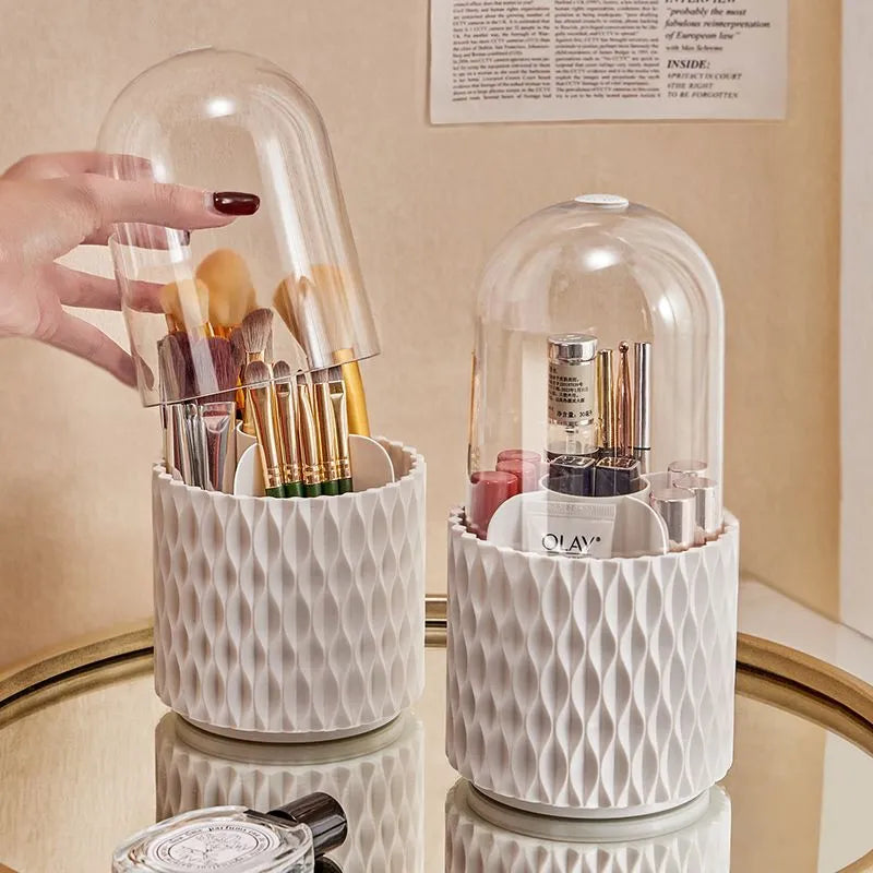 White rotating transparent acrylic makeup brush storage box with lid open showing brush compartments