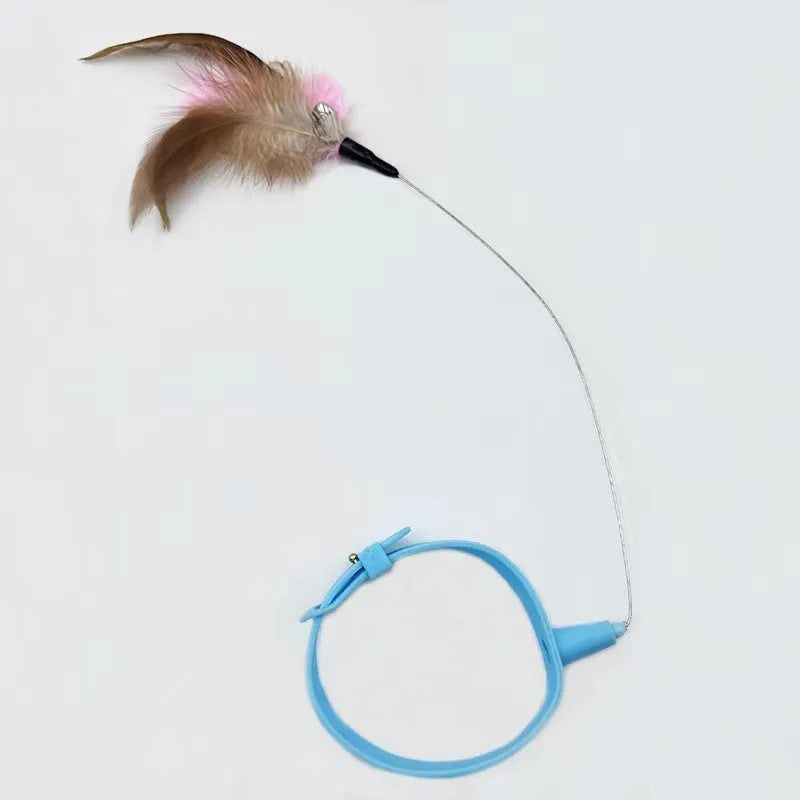 Blue adjustable cat collar with attached silicone teasing wand, feather, and bell for interactive play.