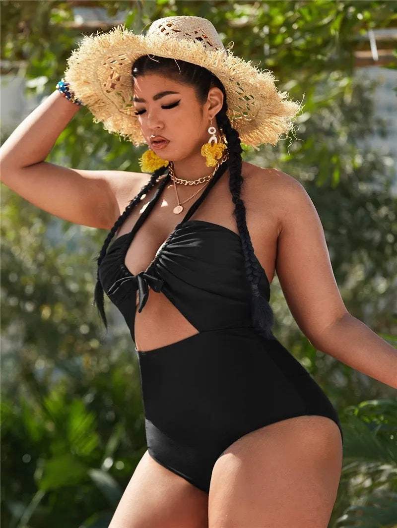 Plus size green tie dye one piece swimsuit on model, polyester fabric, sizes 0XL to 4XL
