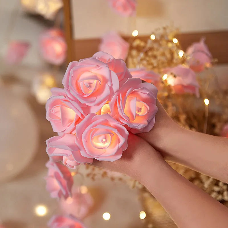 LED rose fairy light string with battery pack for indoor holiday decoration.