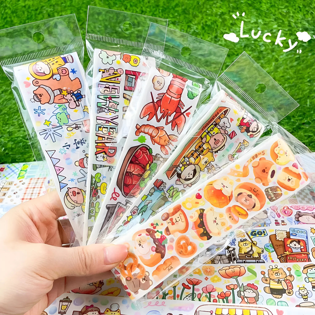 Sheet of cute cartoon character stickers for haemorrhoid tape packaging on Japanese paper.