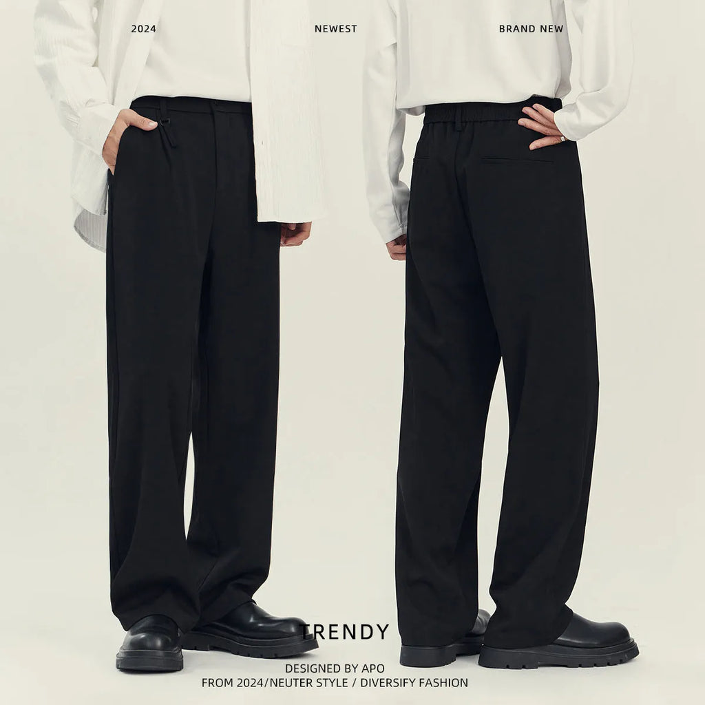 Black drape-effect loose straight-leg business casual trousers on a hanger.