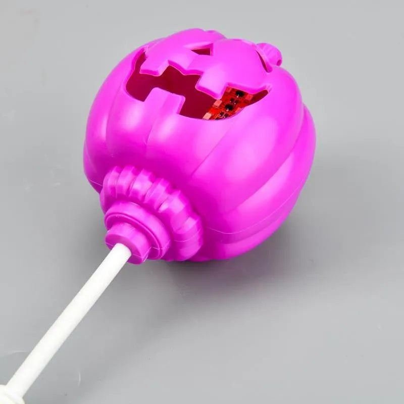Plastic pumpkin decorative lamp with USB charging port and yellow or purple light options