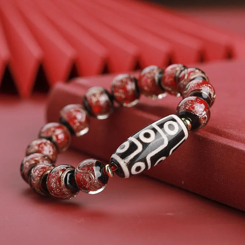 Chinese style bracelet with coloured glaze beads featuring snake patterns in 10mm, 12mm, and 14mm sizes