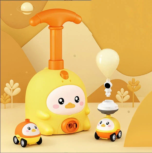 Colorful balloon-powered car toy with various animal designs, featuring a launch tower and balloons for children to propel the car using air power