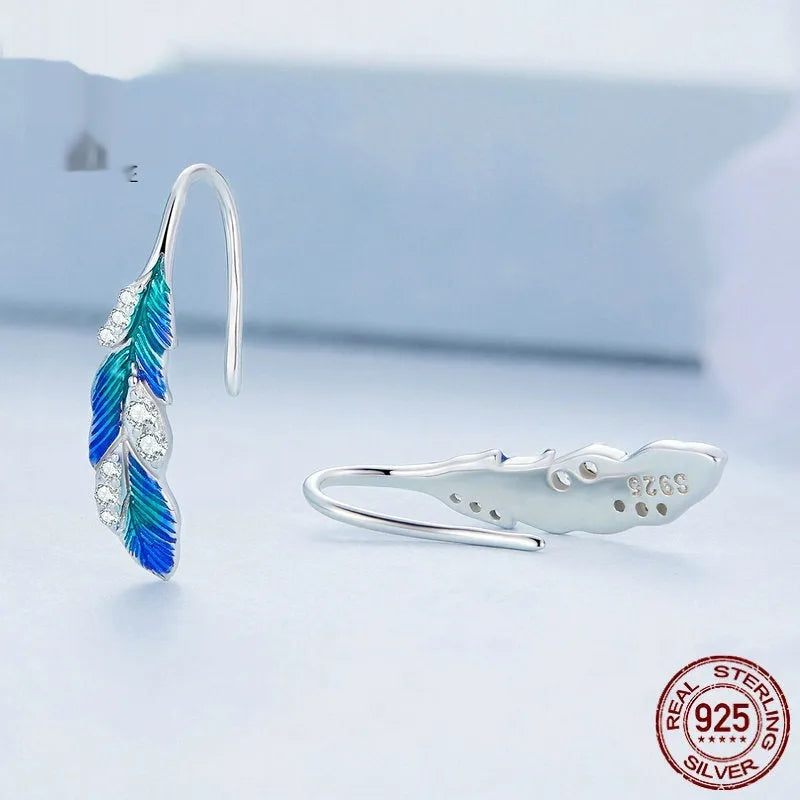 Pair of bright blue gradient feather wing stud earrings white gold plated over 925 silver
