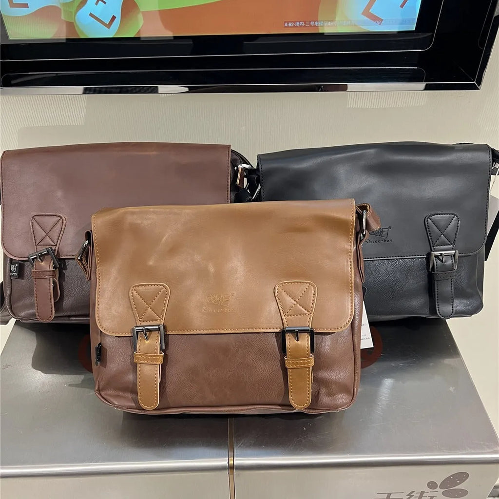 Retro men's messenger bag in light brown PU material with shoulder strap on neutral background