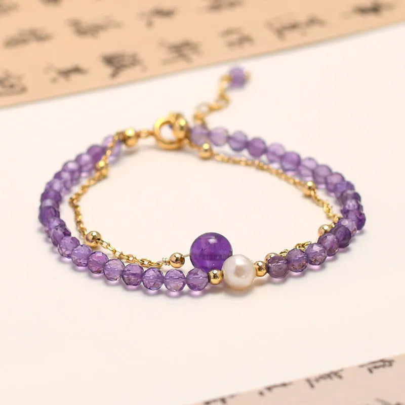 Amethyst-coloured Chinese-style women's crystal bracelet with electroplated finish and diamond shape.