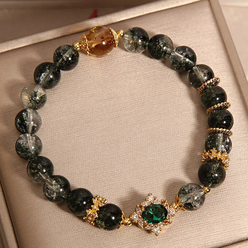 Women's green phantom quartz crystal bracelet with gold rutilated quartz accents and pearl detailing