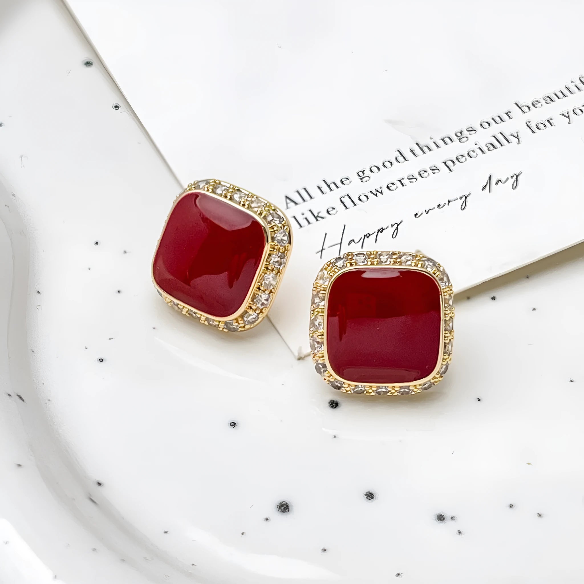 A pair of retro red square geometric alloy earrings with an inlaid design detail.