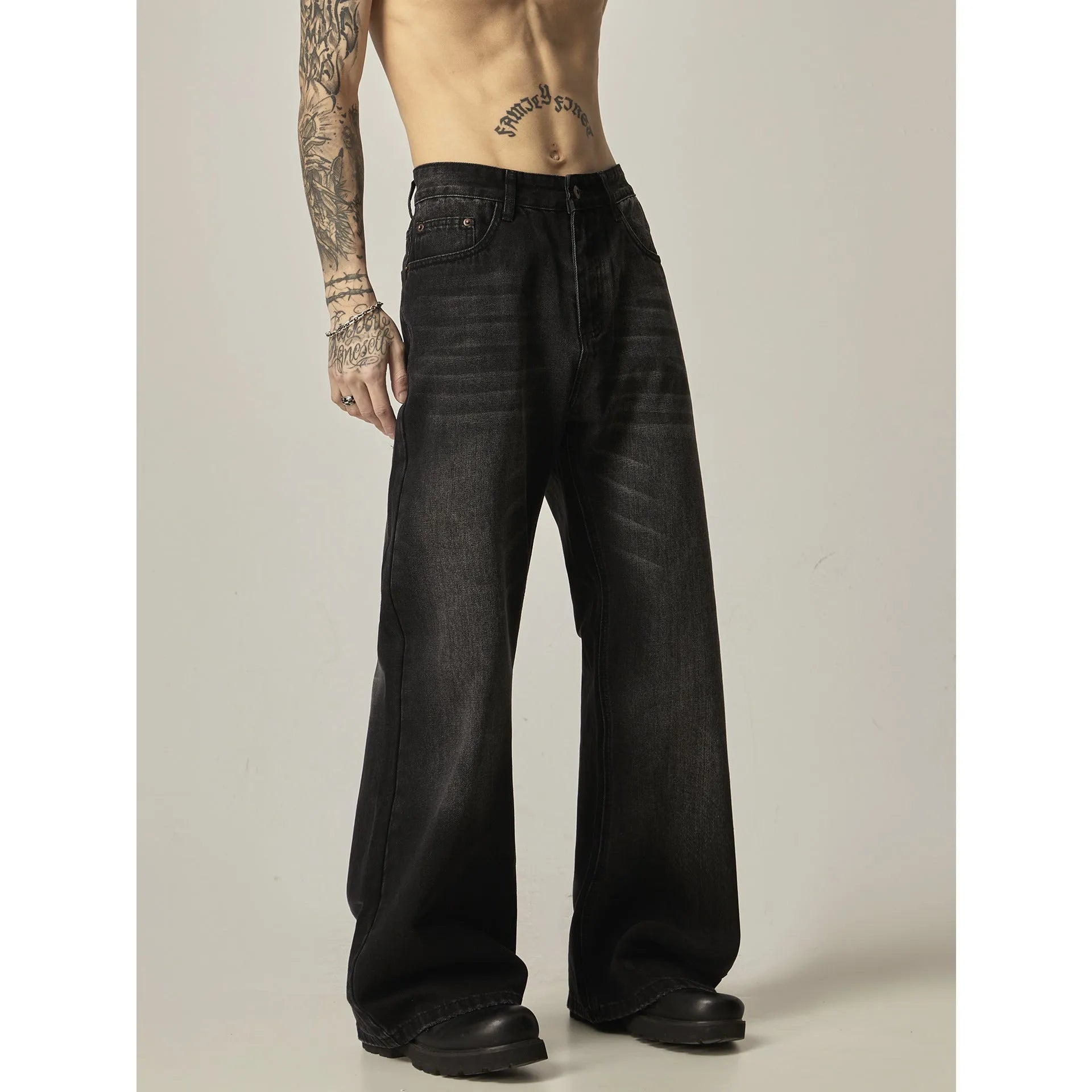 Black loose straight retro jeans with zipper fly shown from front and back views