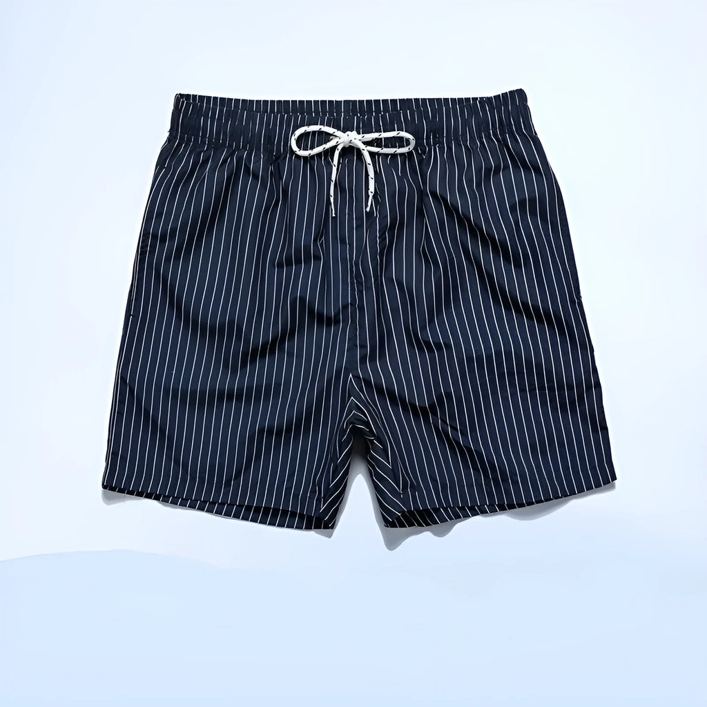 Men's polyester beach shorts with striped triangle pattern in navy blue colour showing straight leg opening