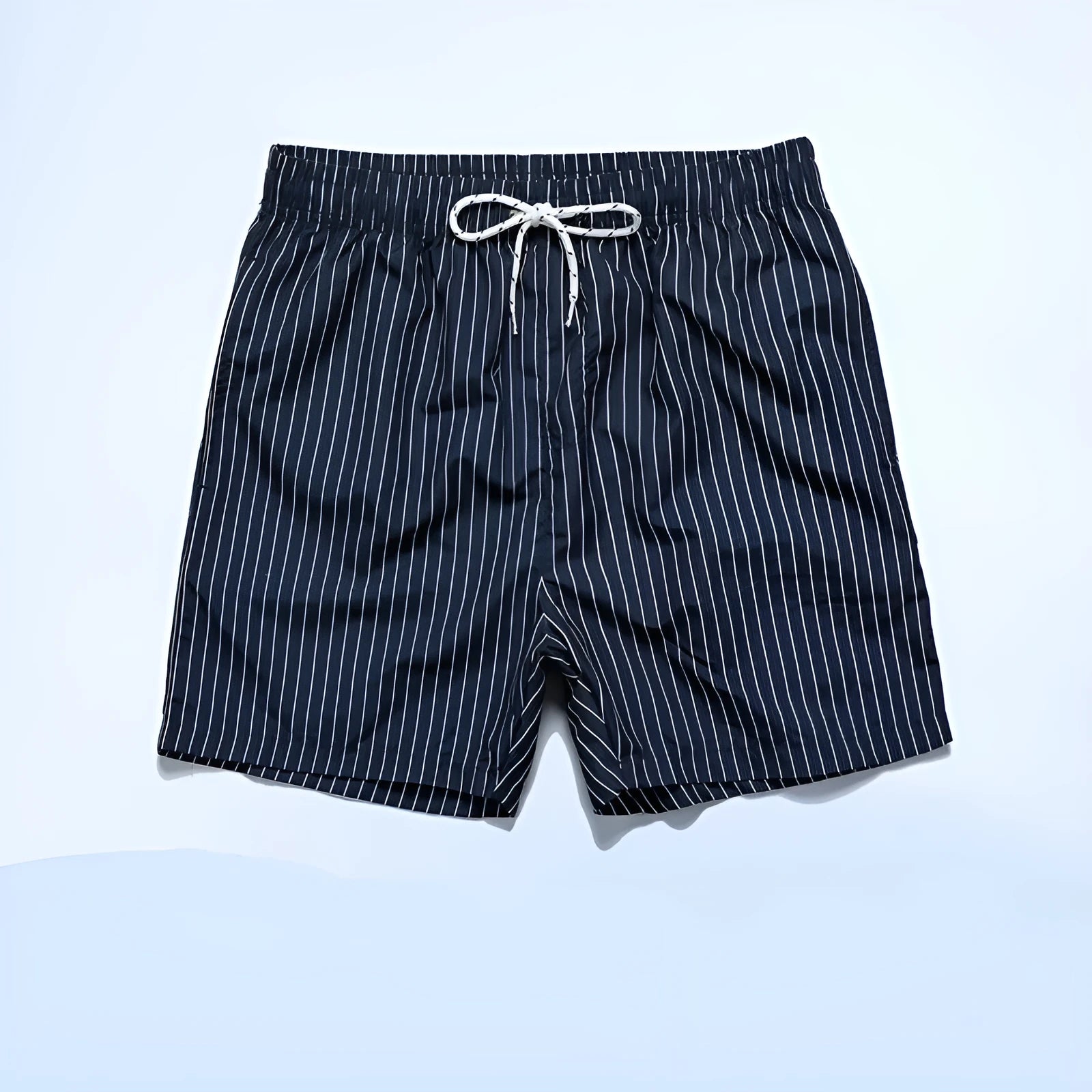 Men's polyester beach shorts with striped triangle pattern in navy blue colour showing straight leg opening