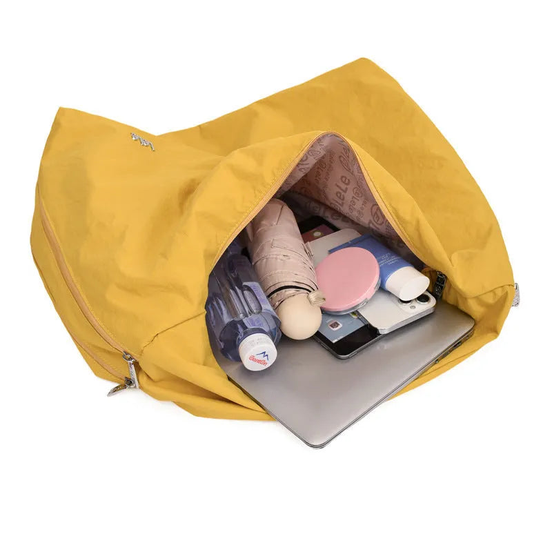 Women's soft nylon heart-shaped underarm shoulder bag in black, yellow, khaki, or blue colour with large capacity