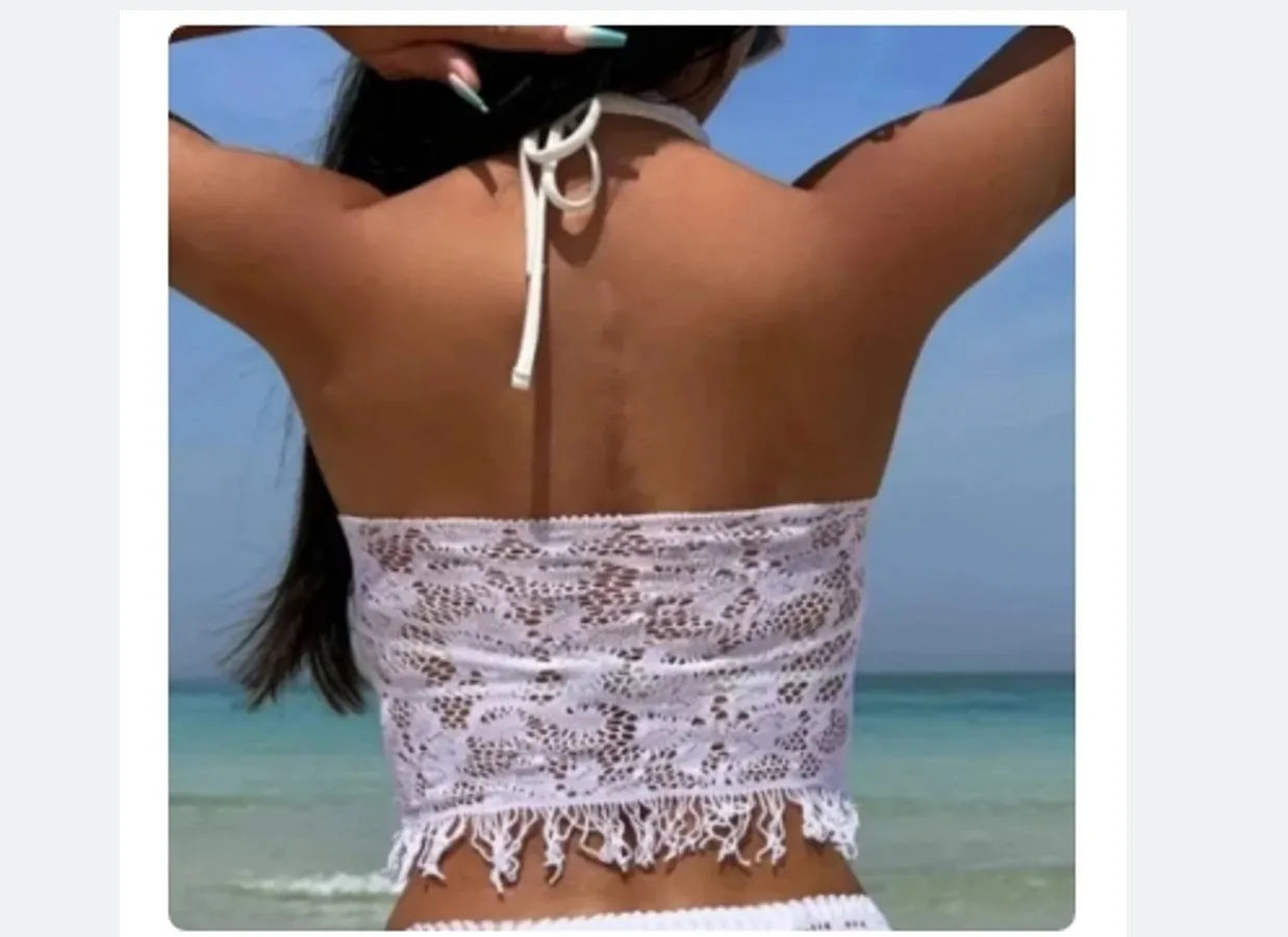 Women's white two-piece swimsuit with lace bikini top and tassel skirt beach cover-up