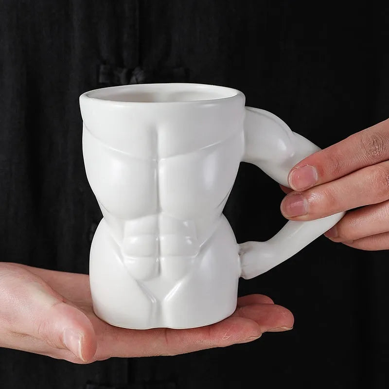 Matte black ceramic mug with muscle design and 300ml capacity