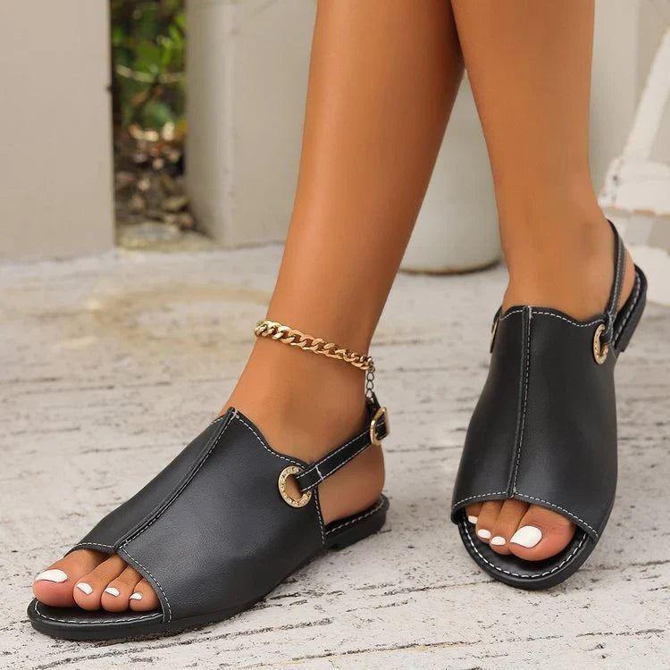 Fashionable peep-toe sandals with adjustable strap, available in black and white colors, designed for comfortable summer wear