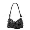 Soft polyester women's crossbody bag shown in black, gold, or silver, with an adjustable shoulder strap.
