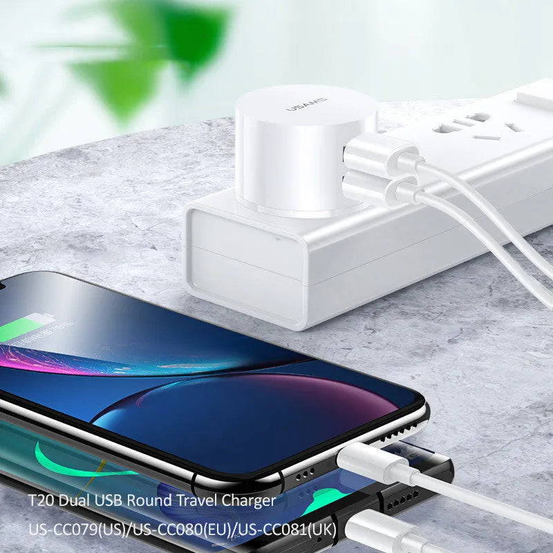 White portable universal dual USB charger with EU, UK and US adaptor heads for international travel