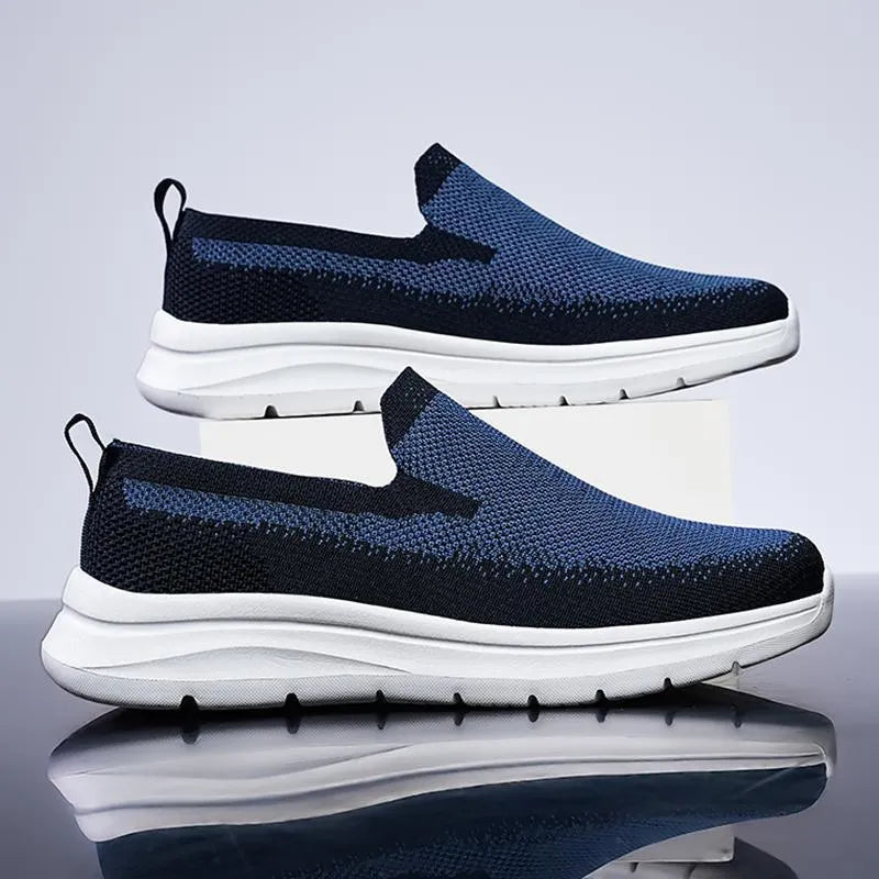 Plus size men's mesh trainers, low top, soft rubber sole, available in black grey, dark blue, sizes 39-48.