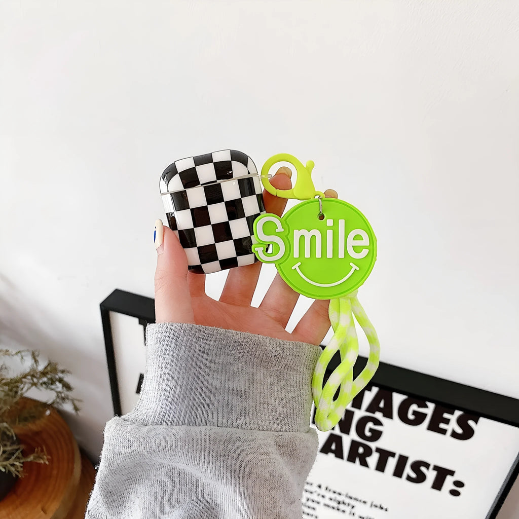 Black and green checkerboard pattern TPU protective case for Apple AirPods with pendant variations