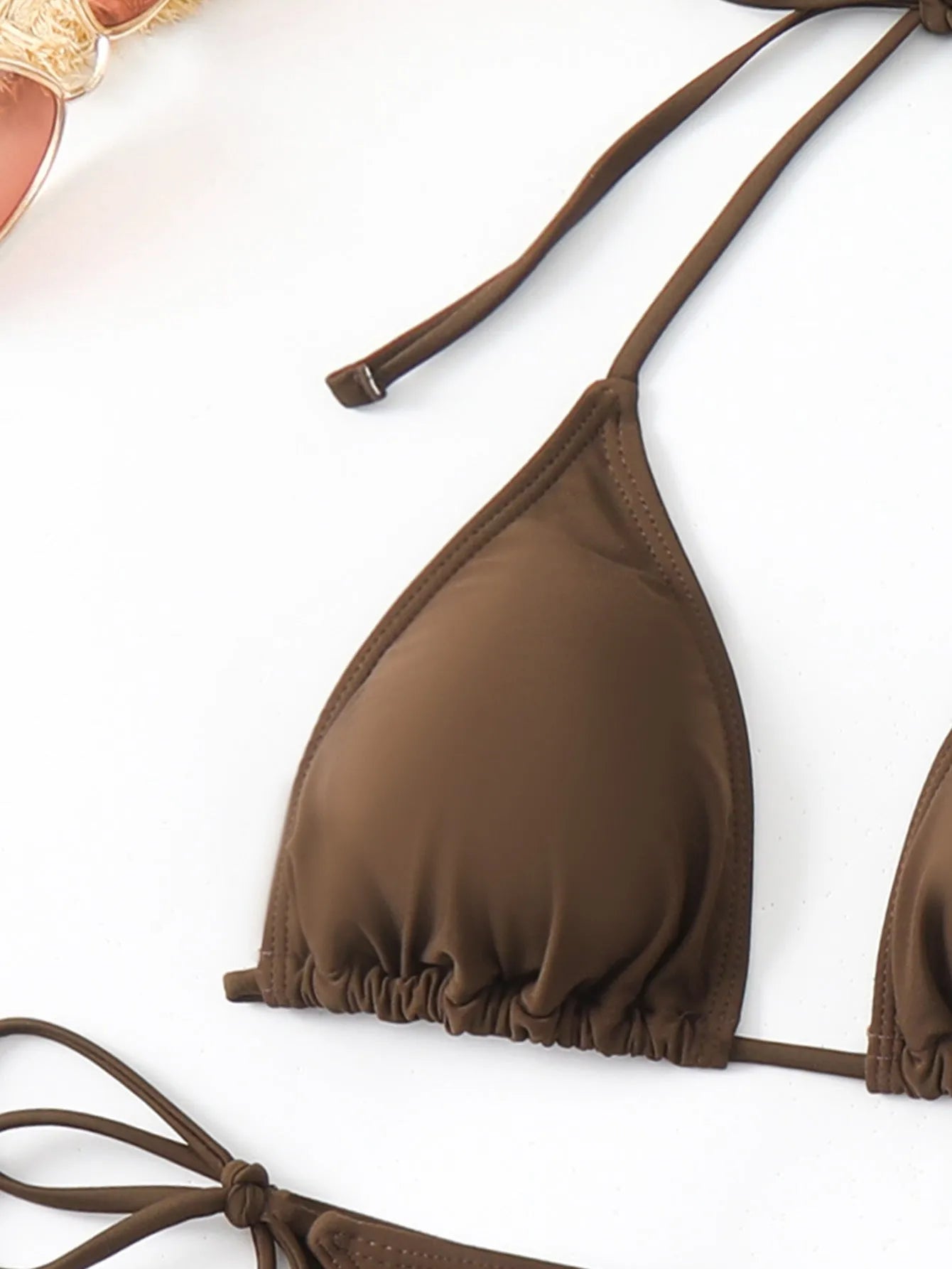 Brown solid colour women's three-piece bikini set with bra, shorts, and blouse